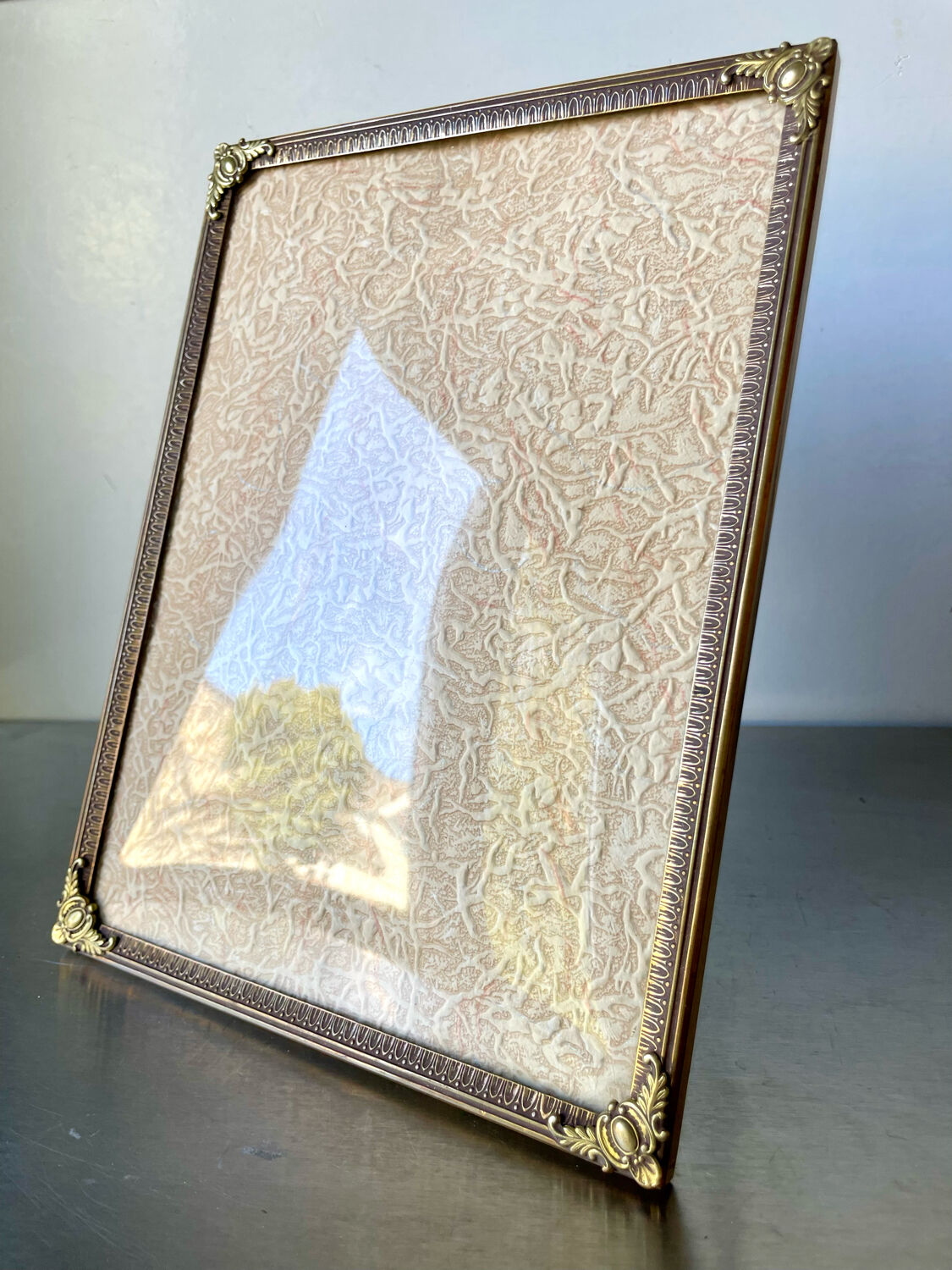 Metal vintage frame in gold colored brass