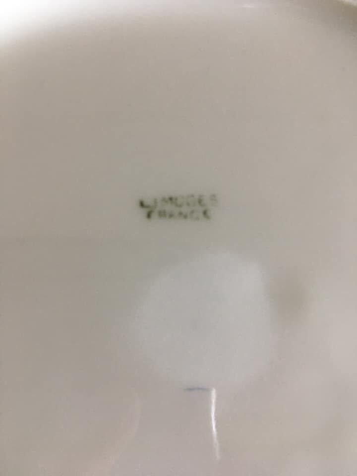4 mismatched flat plates with floral patterns. Porcelain. Stamped