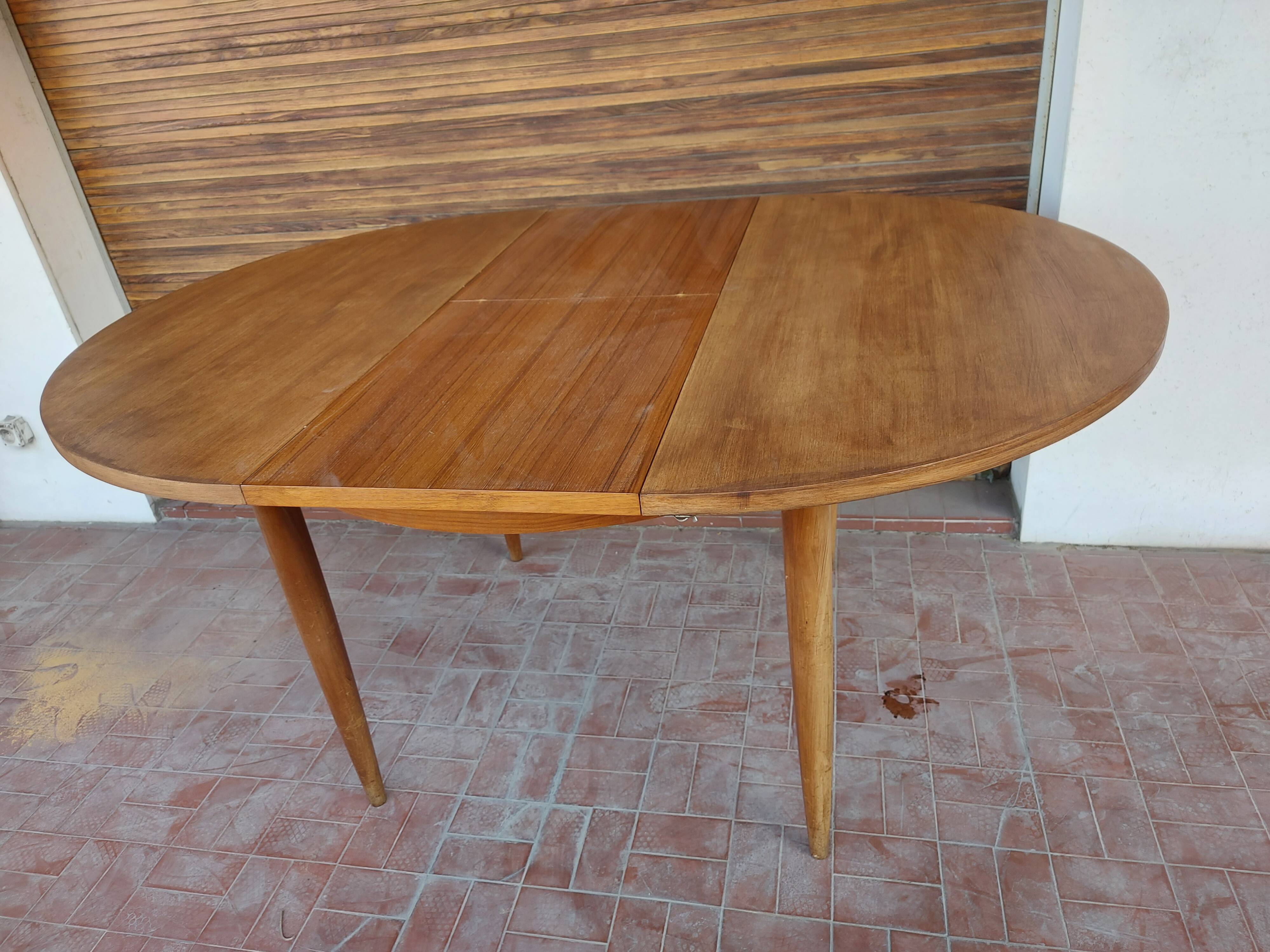 Scandinavian design teak table with extension cord