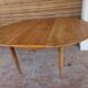Scandinavian design teak table with extension cord