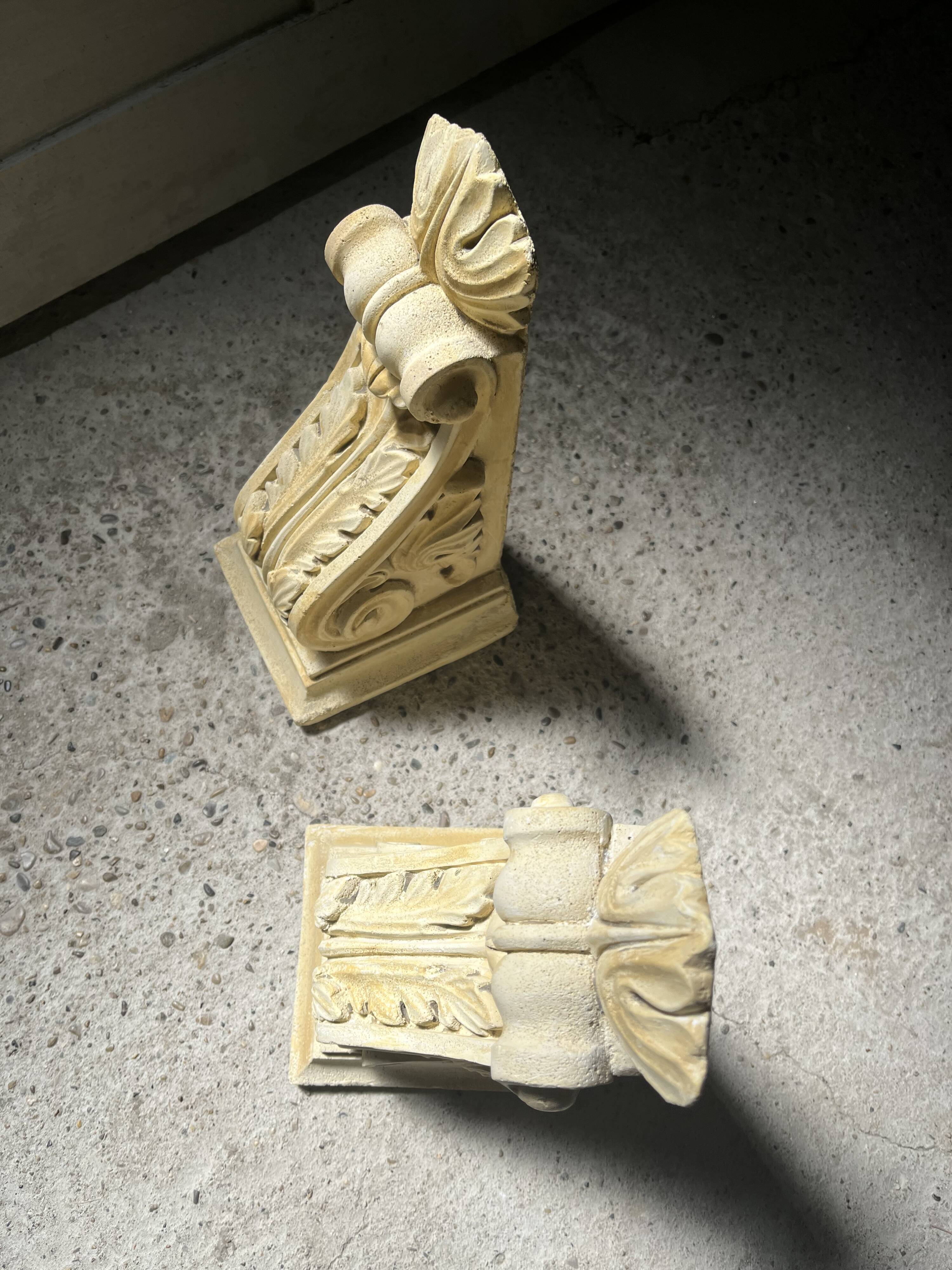 Moulded plaster bookends