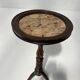 Napoleon III style gueridon in walnut and marble, 20th century.