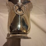 Stainless steel champagne bucket, silversmith Jean Couzon, model on a pedestal.