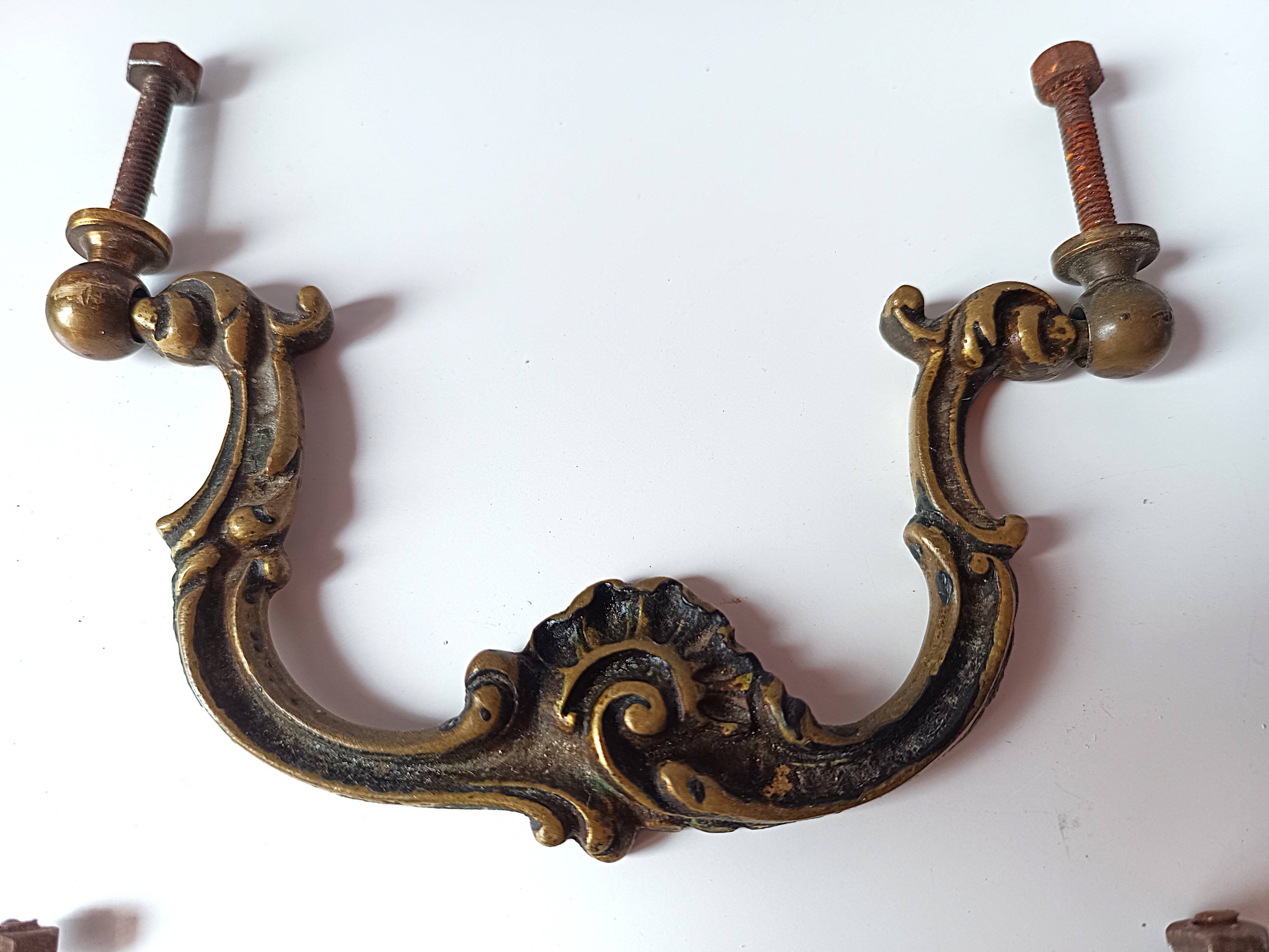 Antique pair of bronze drawer handles.