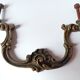 Antique pair of bronze drawer handles.