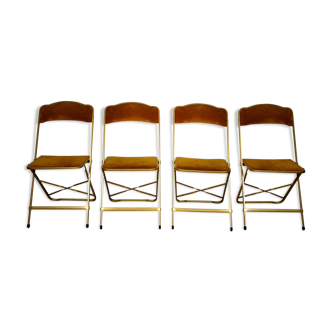 Suite de 4 chaises pliantes en velours doré