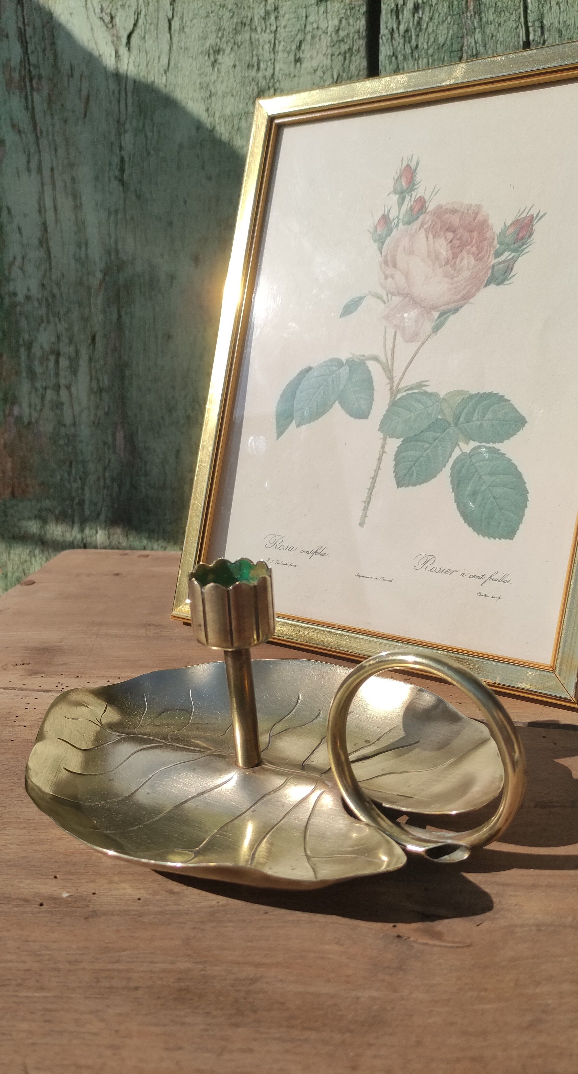 Vintage candle holder in golden brass