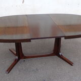 Dark tinted Baumann extendable table