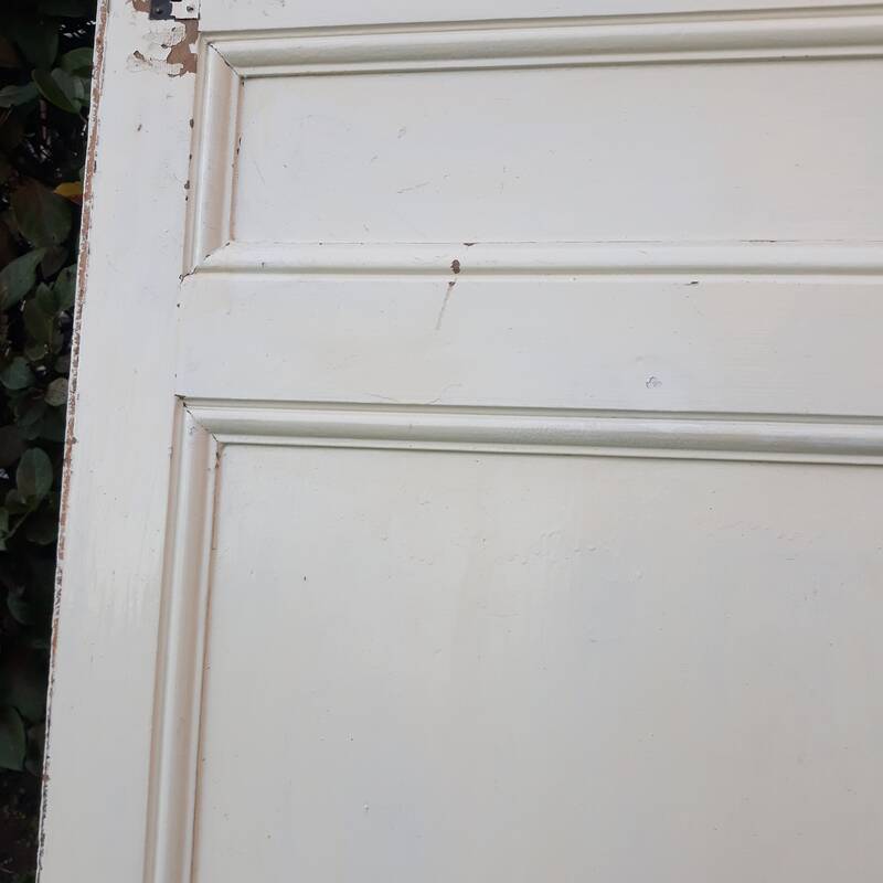 Communication door H220xW80.5cm, old panelled with moulding.