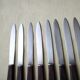 Set of 8 vintage stainless steel and brown bakelite table knives