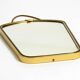 Beautiful small mid-century brass wall mirror with braided hanging strap