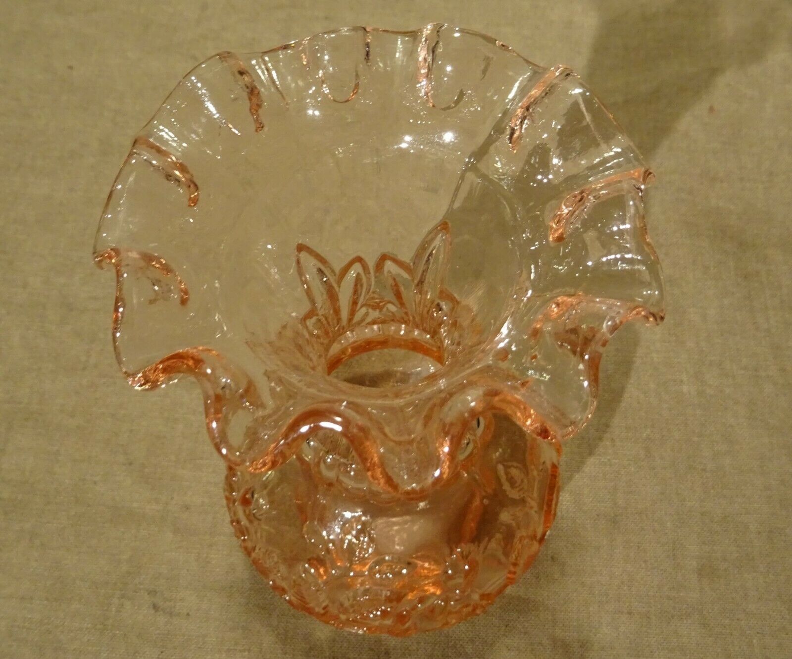Pink molded pressed glass vase decorated with hazel foliage