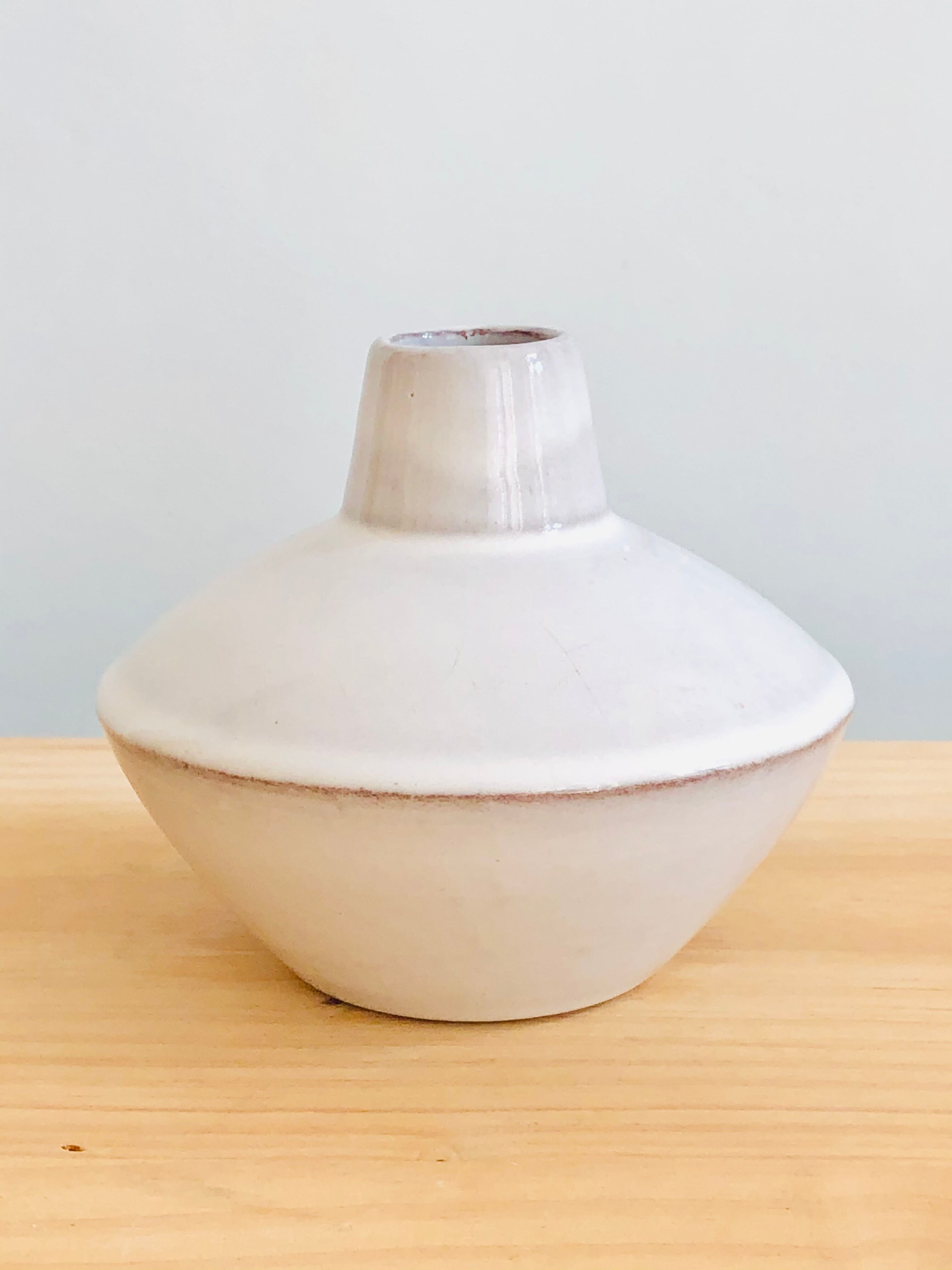 White enamelled terracotta vase