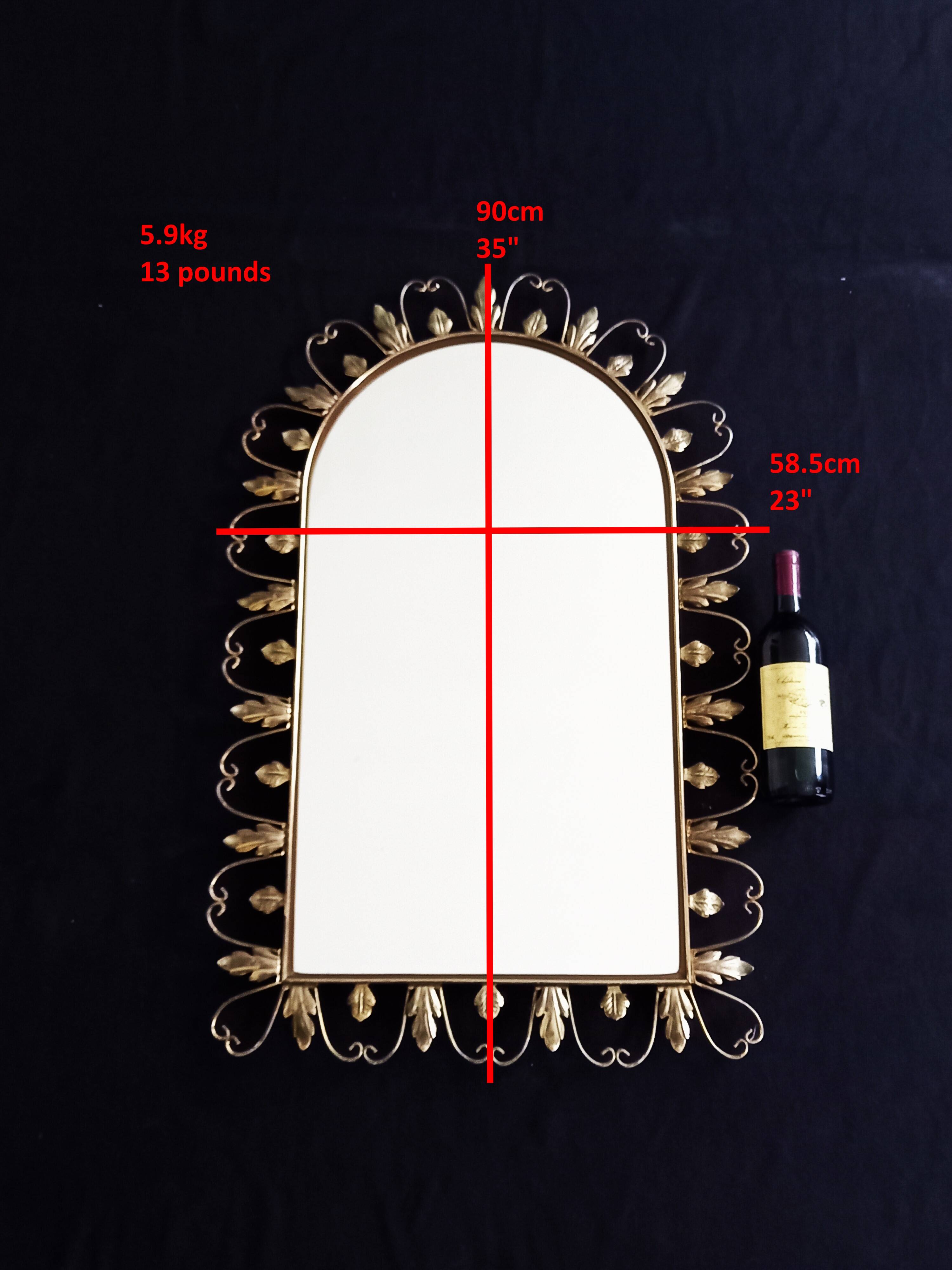 Large arched mirror with acanthus leaves and scrolls in gold metal from deknudt, 1960s