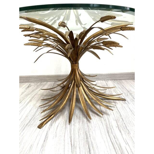 Old gold florentine wrought iron ears cofee table