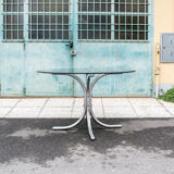 Round table in chromed metal and glass Italia Anni '60