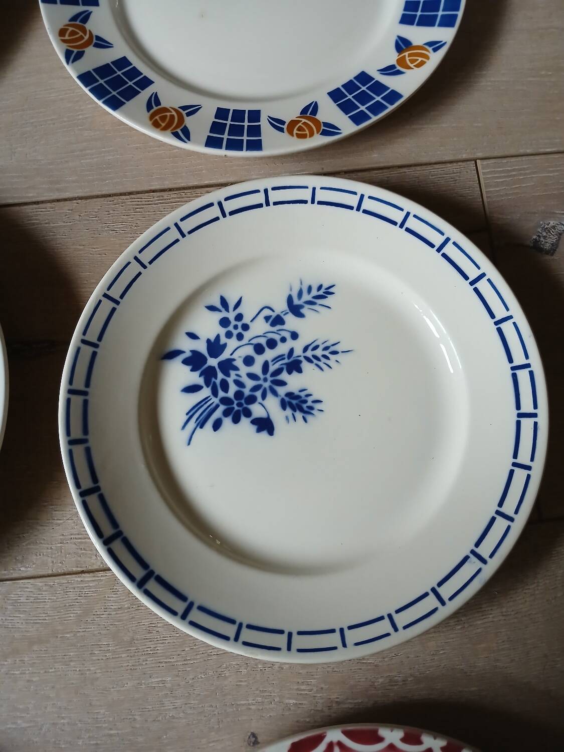 12 mismatched antique dinner plates