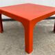 Square orange fiberglass coffee table