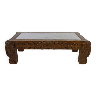 Solid oak coffee table carved with fauns and gray marble top, France, circa 1940