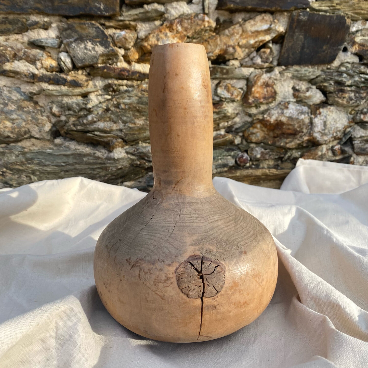 Wooden vase, brutalist, wabi-sabi, vintage craftsmanship.