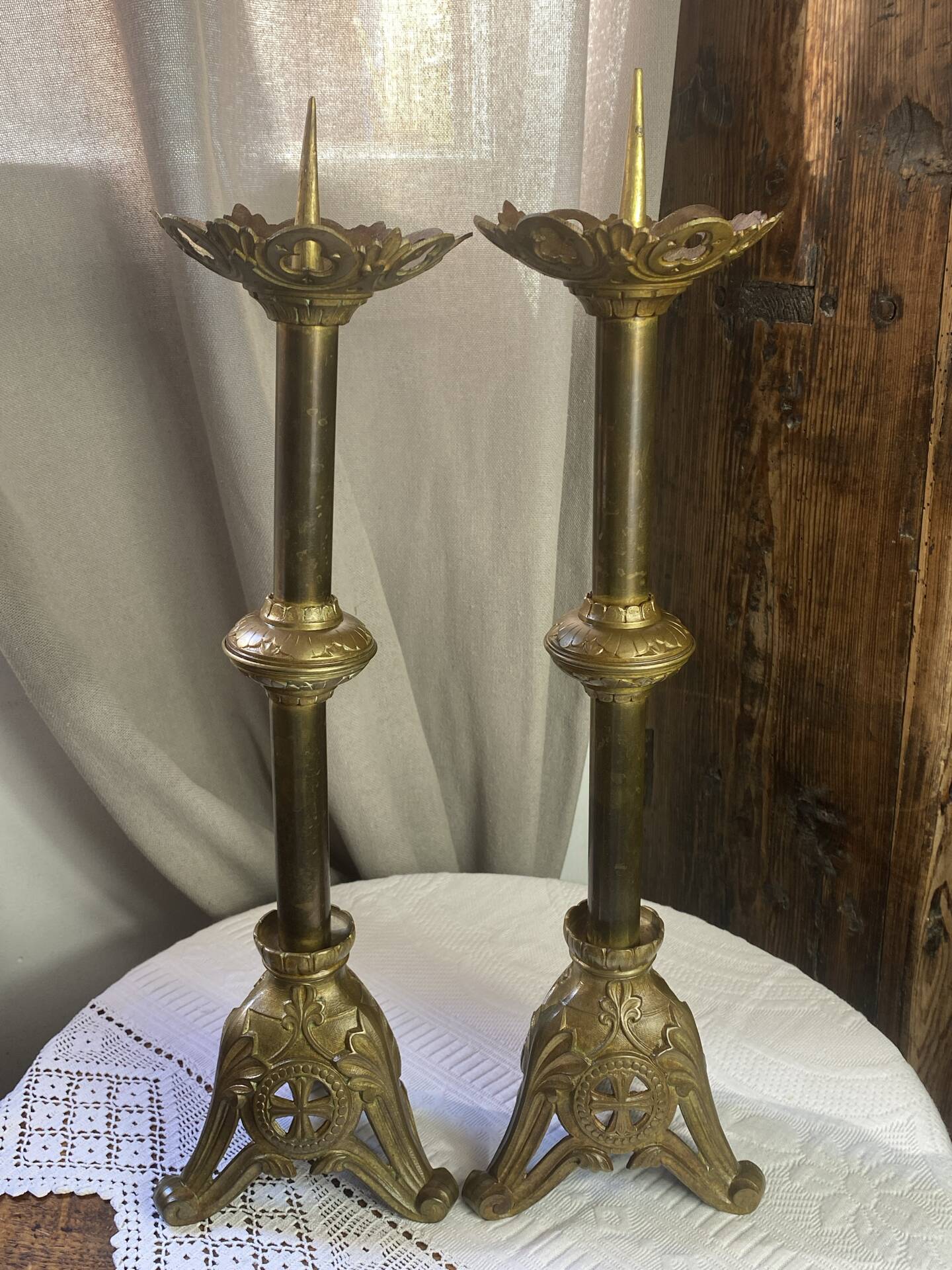 Pair of candlesticks in bronze and brass