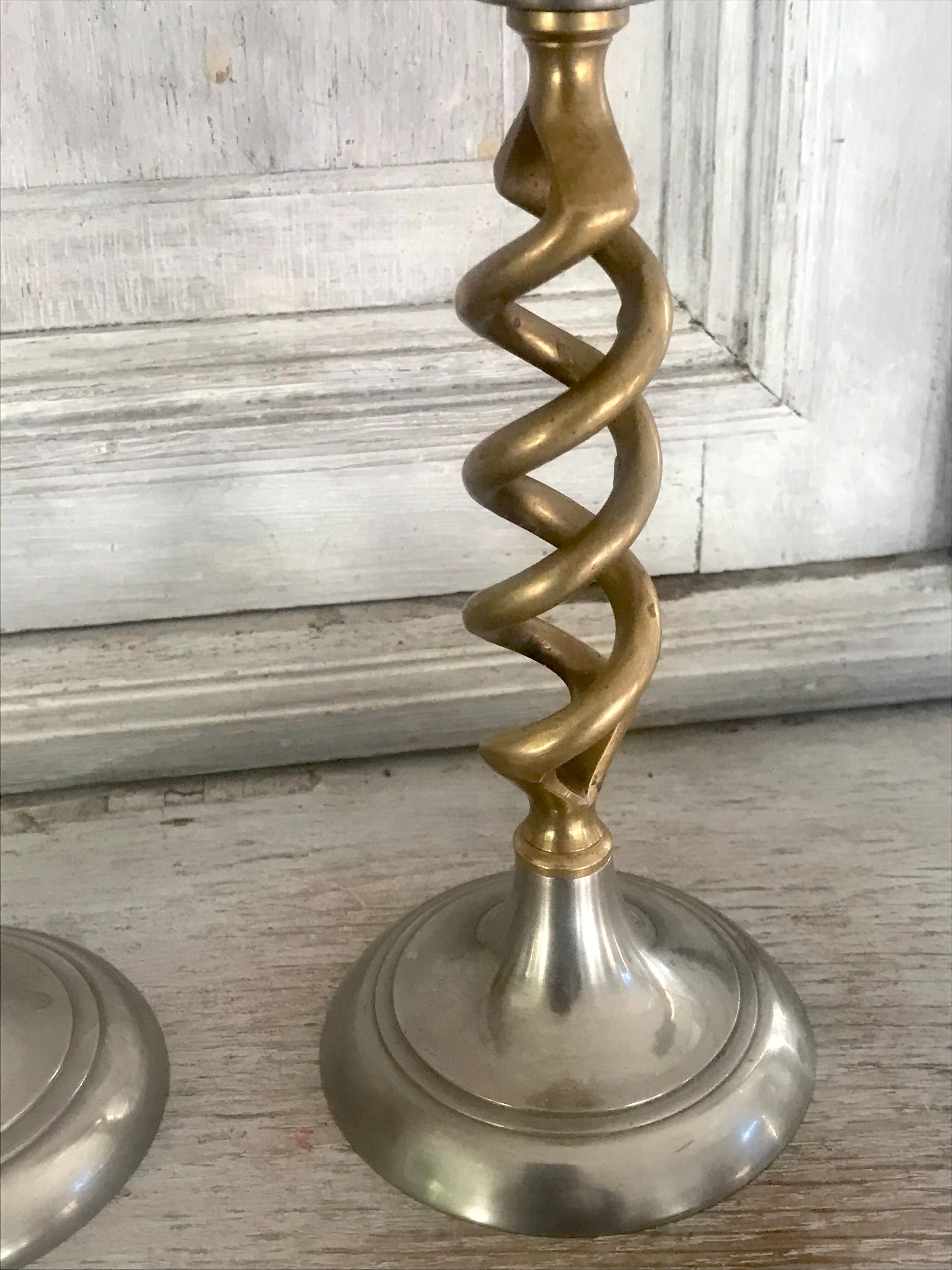 Pair of twisted brass candle holders