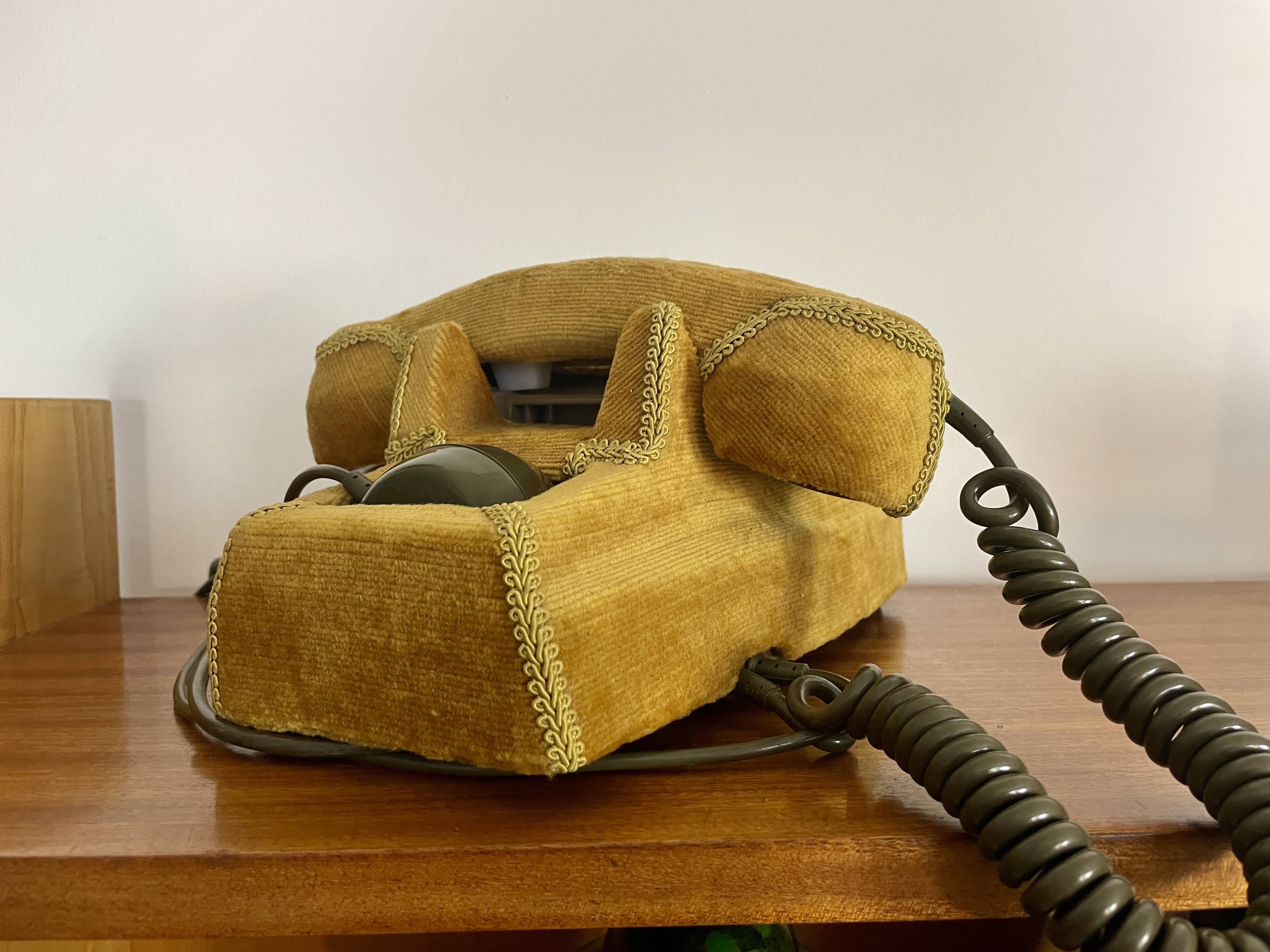 Socotel S63 telephone with its gold velvet shell