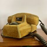 Socotel S63 telephone with its gold velvet shell