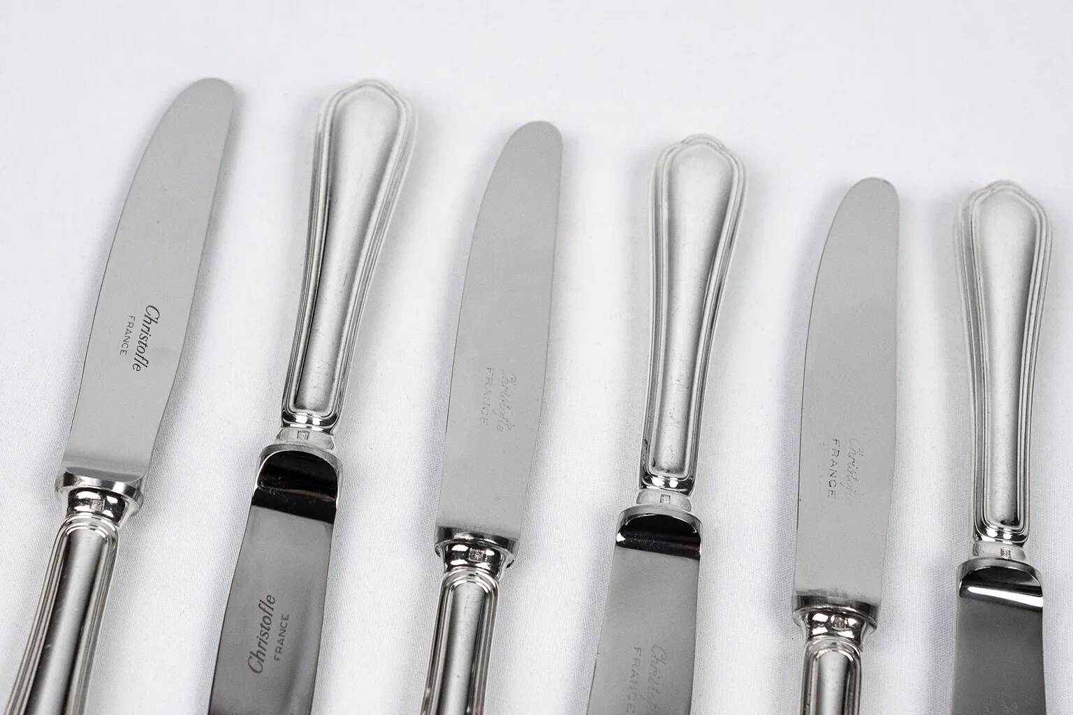 Christofle – 12 silver-plated dessert knives, Spatours model
