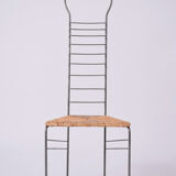Pair of iron and straw chairs, 1980s.