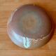 Set of 10 turned stoneware plates, pyritised and glazed, wabi-sabi brutalist.