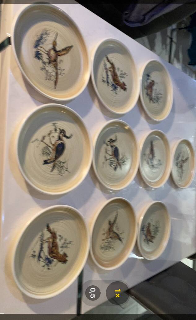 Many vintage flat plates from Sarreguemines.