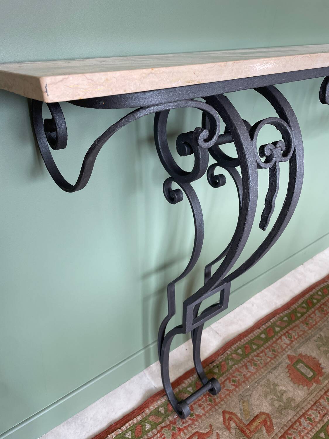 Black wrought iron & beige marble console table