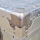 Riveted metal transport trunk
