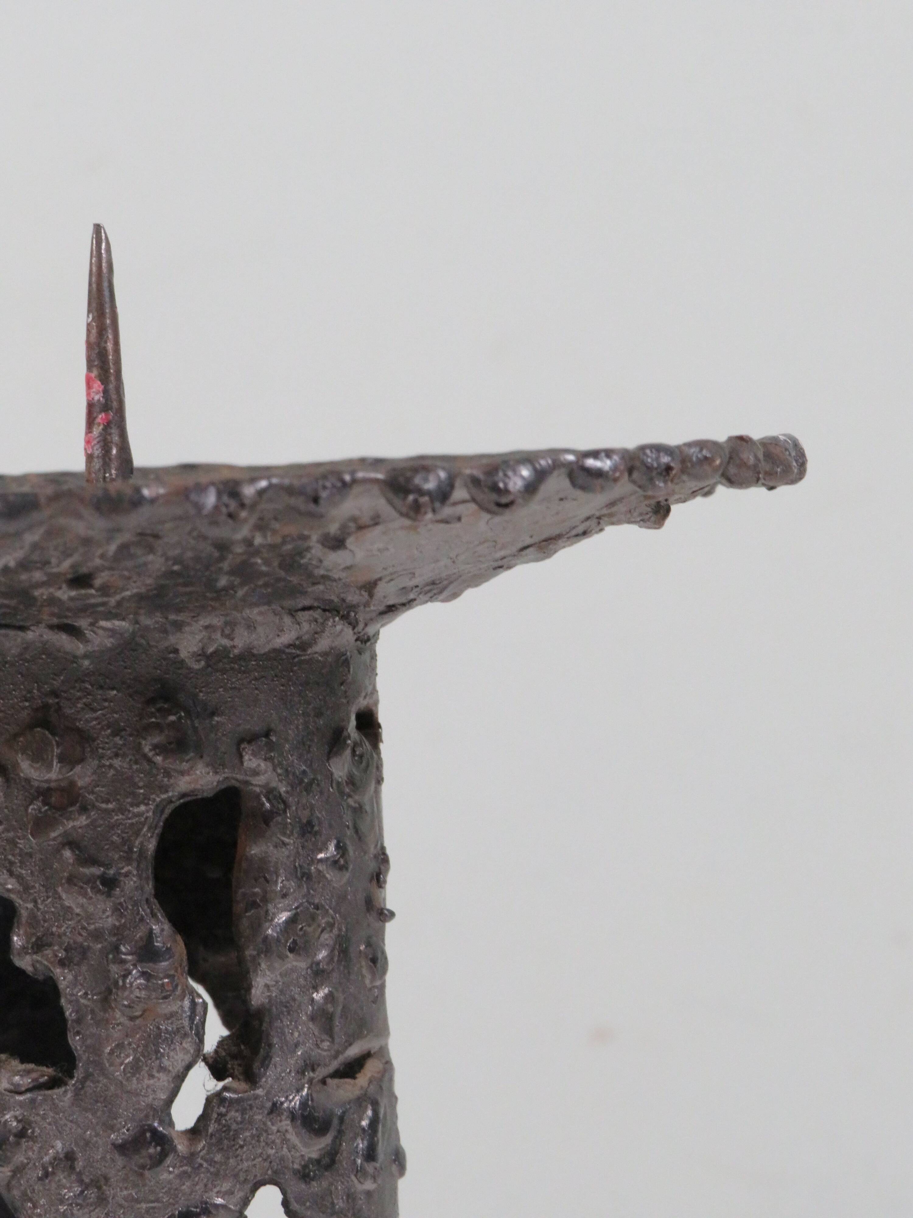 Brutalist wrought iron candlestick, European craftsmanship, 1960s