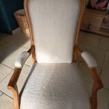 Renovated Voltaire armchair with boucle fabric.