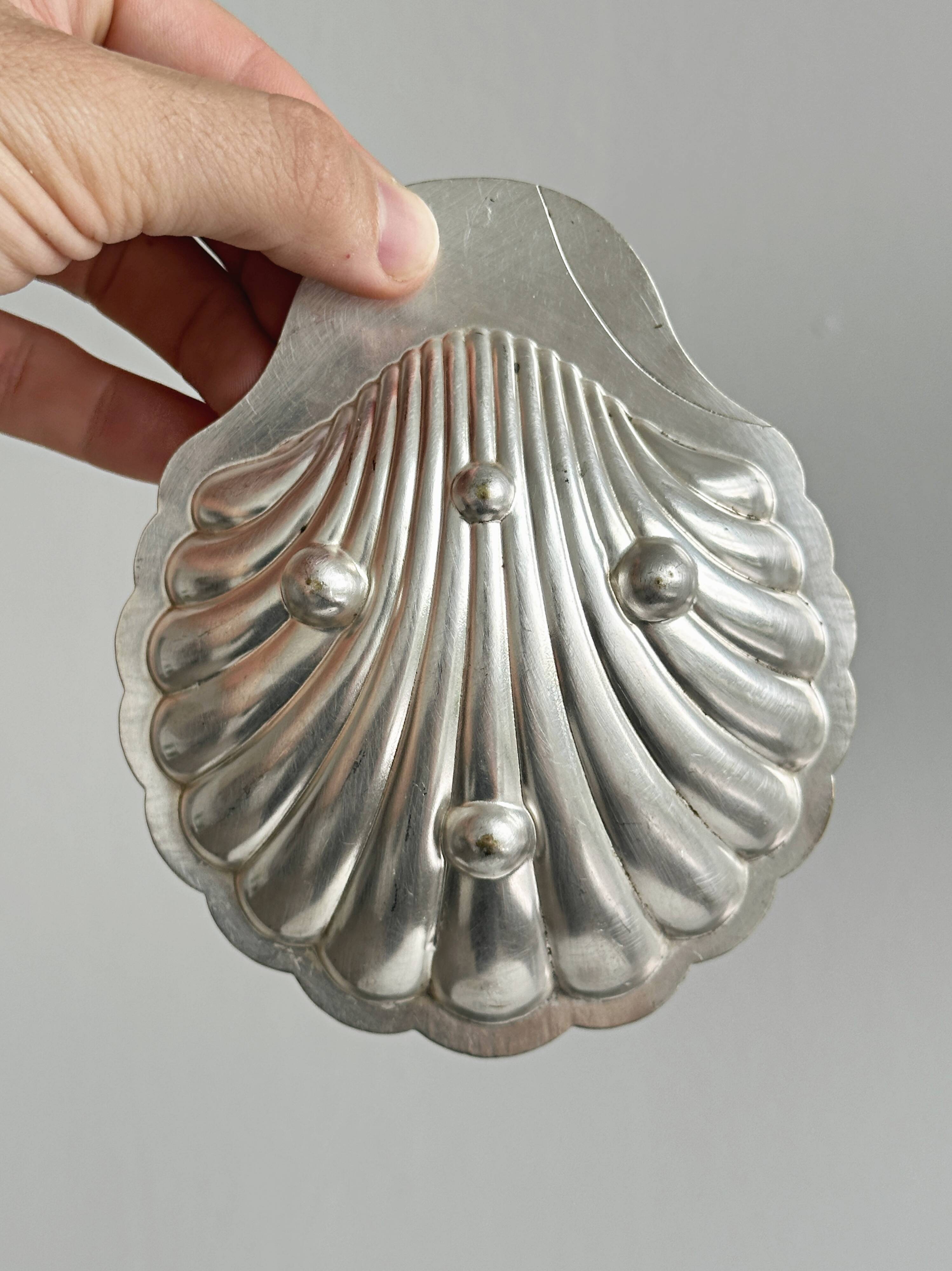 Pair of silver shell bowls