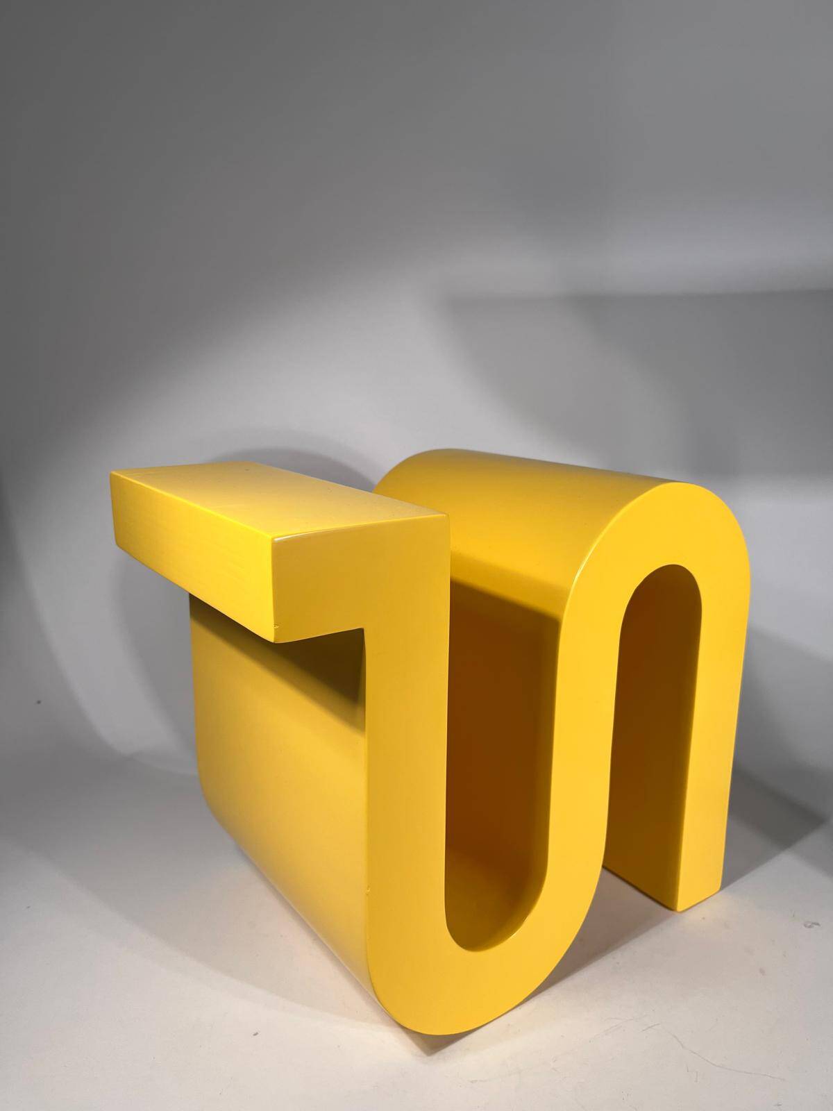 Yellow book or magazine holder by Axel Chay for Monorpix