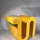 Yellow book or magazine holder by Axel Chay for Monorpix