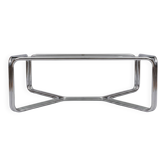 Chrome coffee table with a glass top.
