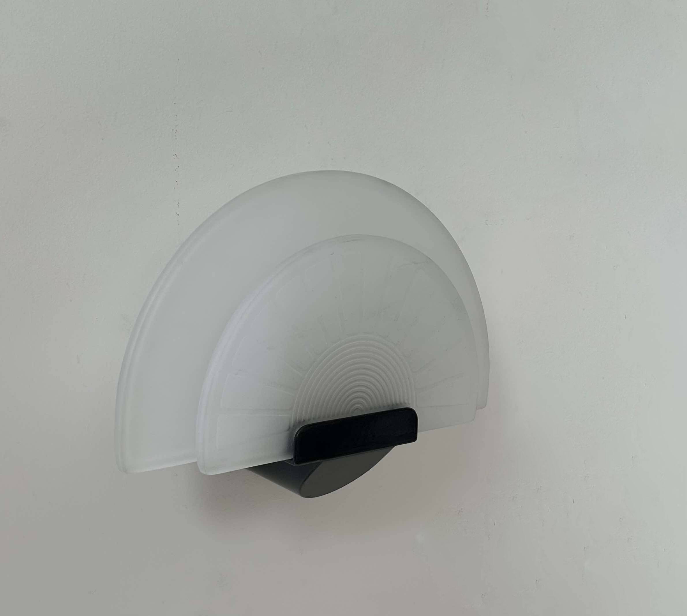 Vintage wall lamp "Diva" Ezio Didone for Arteluce, sandblasted glass and black metal, Italy 1970