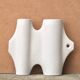 Sgrafo Modern sculptural white porcelain vase by Peter Muller