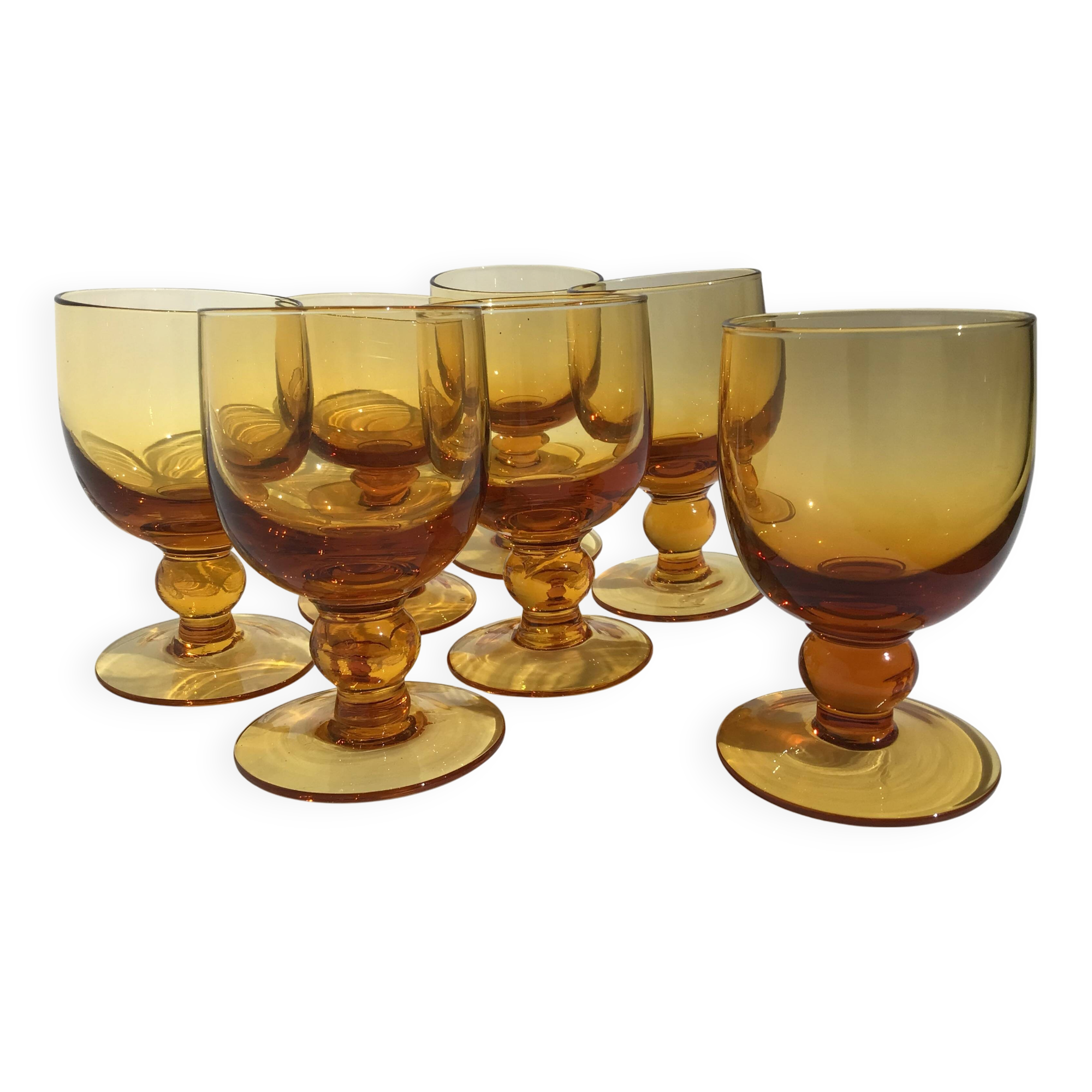 7 Amber stemmed glasses