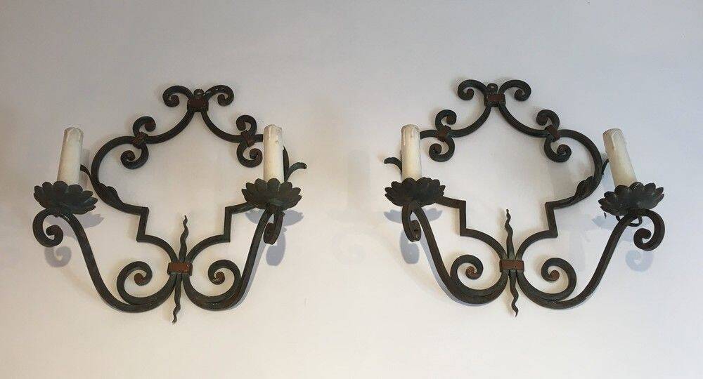 Pair of large decorative wrought iron wall sconces