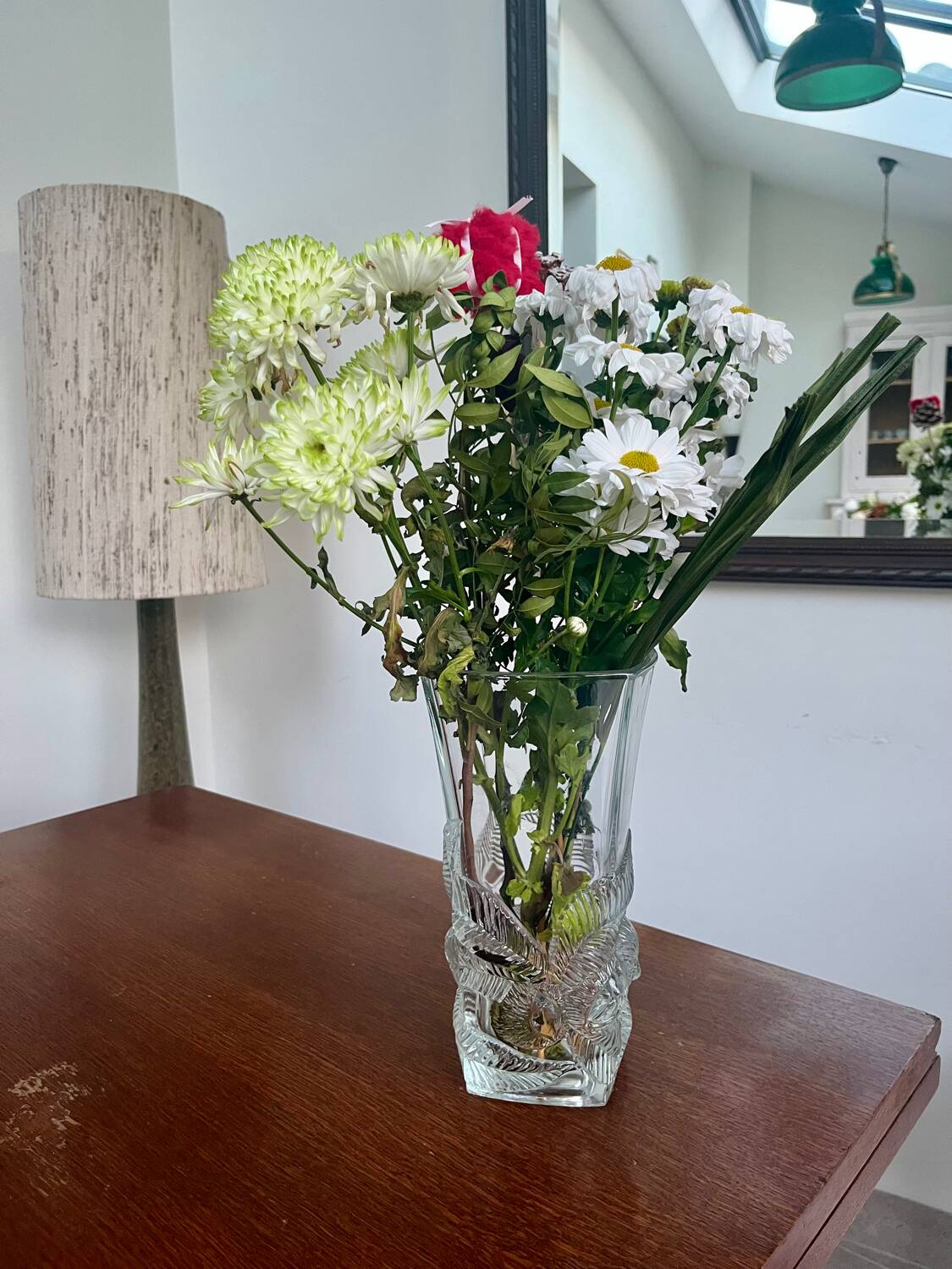 Large moulded glass vase with a floral design