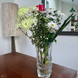 Large moulded glass vase with a floral design