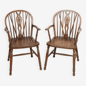 Pair of Windsor armchairs in dark oak