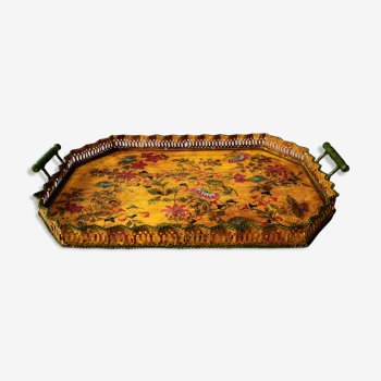 Metal serving tray with floral decoration handle