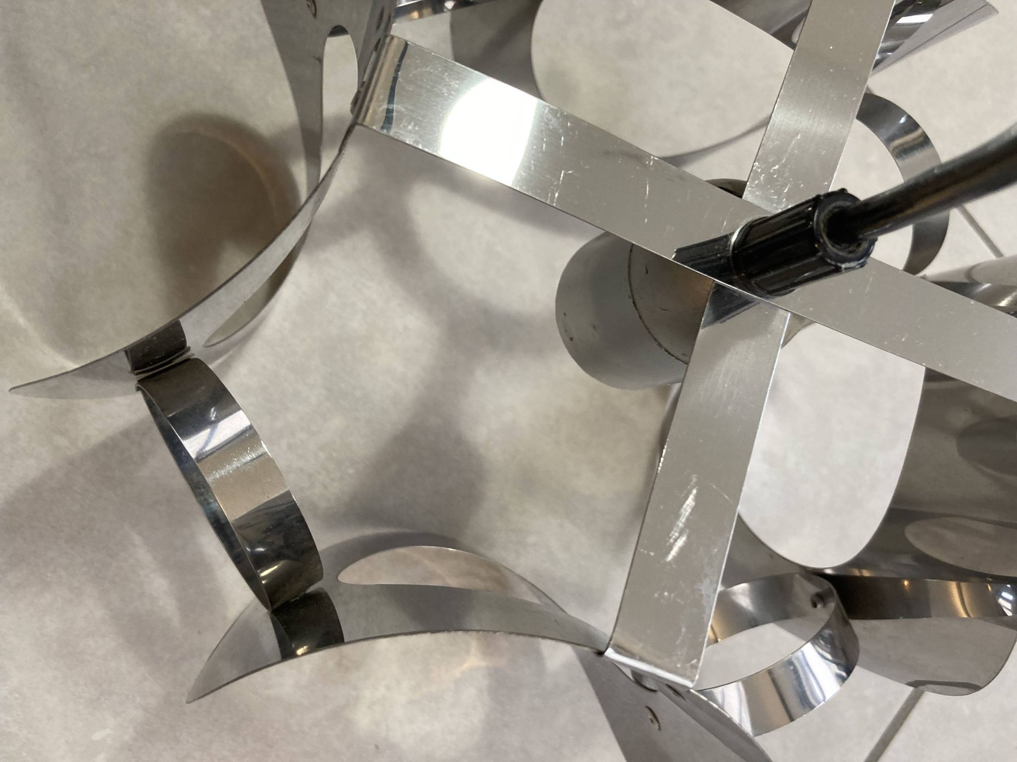 space age chrome metal suspension