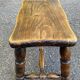 Small vintage low stool made of turned solid wood footrest 1960